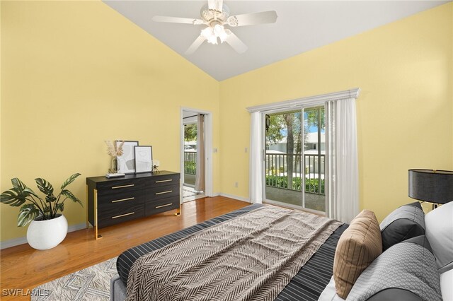 1010 Partridge Cir Unit 202, Naples, FL 34104 - bedroom with access to exterior, wood finished floors, baseboards, high vaulted ceiling, and a ceiling fan