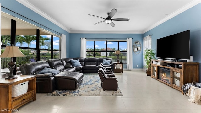 tiled living room featuring ceiling fan and crown molding