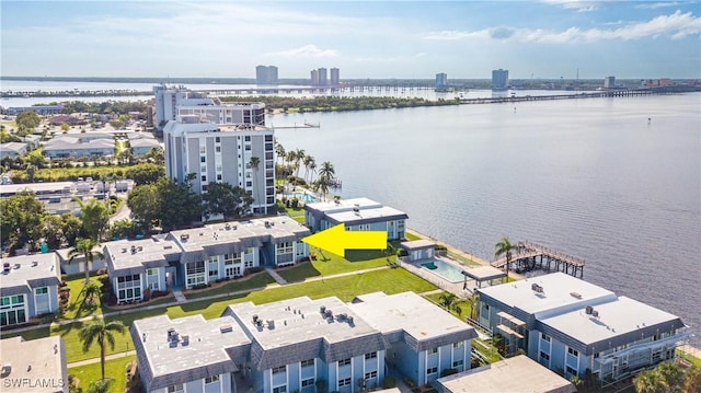 bird's eye view with a city view and a water view