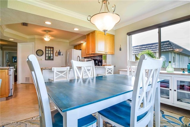 dining area with light tile patterned flooring, recessed lighting, visible vents, and ornamental molding