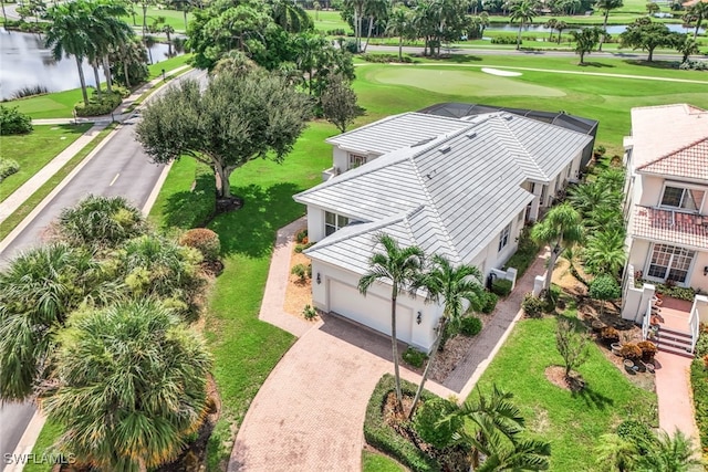 bird's eye view with view of golf course