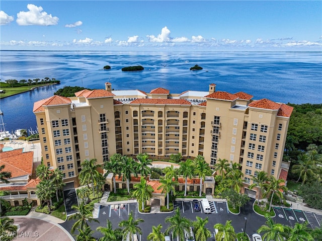 birds eye view of property featuring a water view