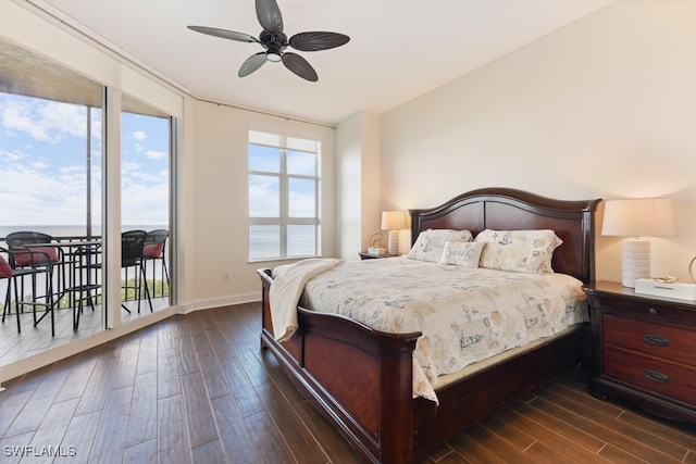 bedroom with ceiling fan, dark hardwood / wood-style floors, and access to outside