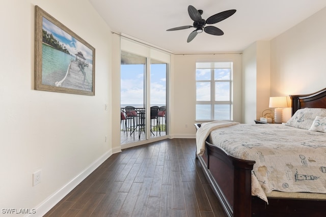 bedroom with ceiling fan, dark hardwood / wood-style flooring, and access to outside