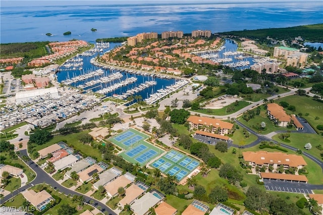 birds eye view of property featuring a water view