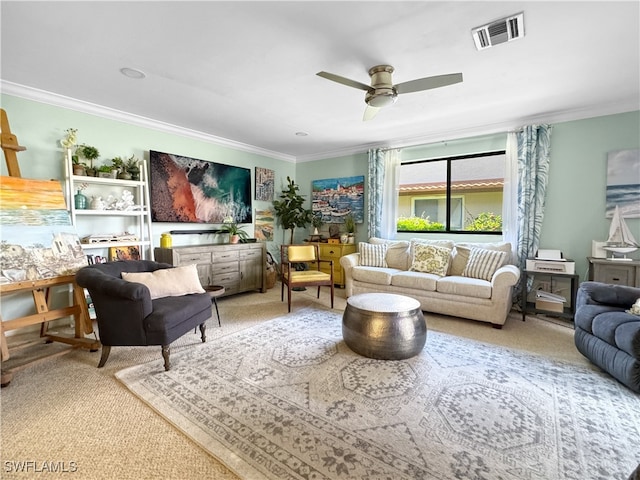 living room featuring ceiling fan, carpet, and crown molding