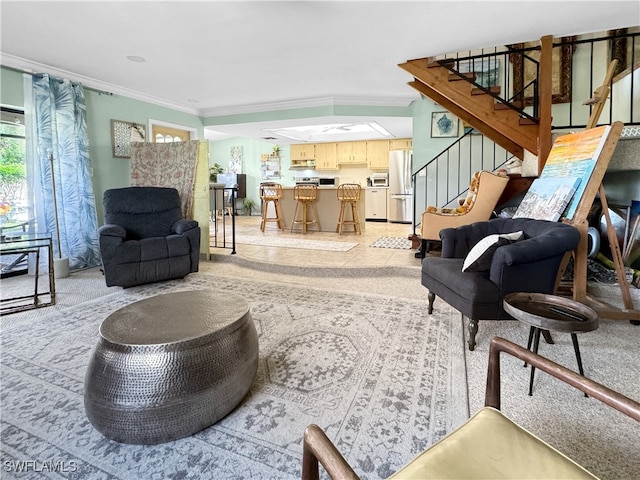 living room with ornamental molding