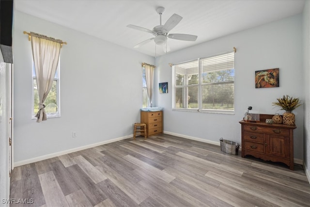 bedroom featuring ceiling fan and light wood-type flooring