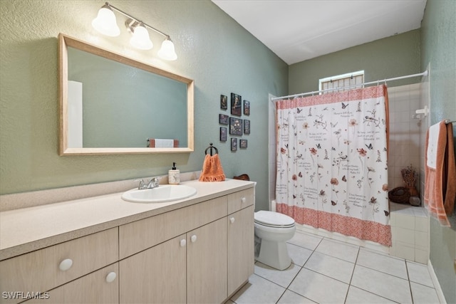 full bathroom with tile patterned floors, shower / bath combo, toilet, and vanity