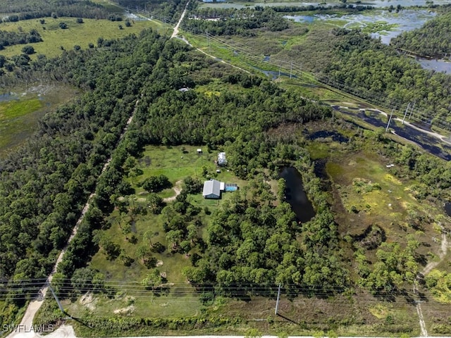 birds eye view of property featuring a rural view