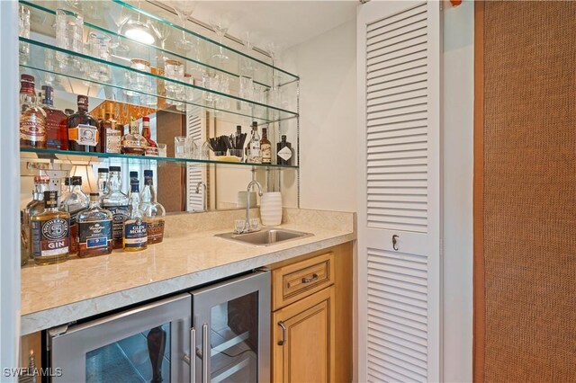 bar featuring sink and wine cooler