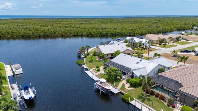 drone / aerial view featuring a water view