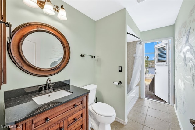 full bathroom featuring shower / bath combo, a chandelier, tile patterned floors, vanity, and toilet