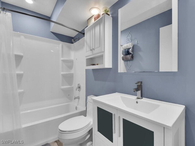 full bathroom with vanity, toilet, and shower / tub combo with curtain