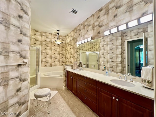 bathroom featuring vanity, separate shower and tub, and tile patterned floors