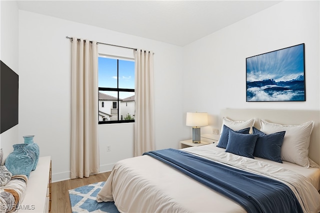 bedroom featuring light hardwood / wood-style floors