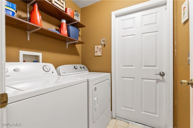 laundry room featuring washer and clothes dryer