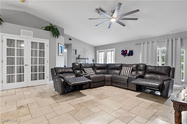 living room with french doors, lofted ceiling, and ceiling fan