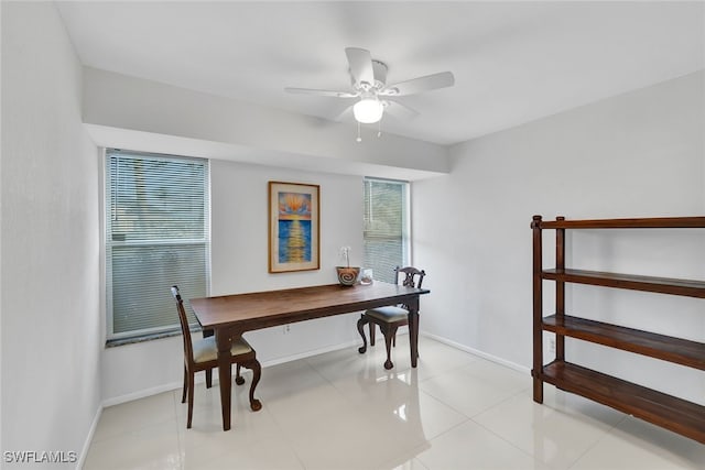 interior space featuring ceiling fan