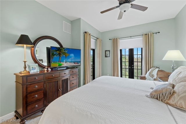 bedroom featuring access to exterior, ceiling fan, and french doors