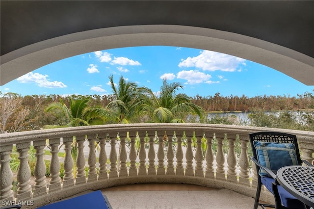 balcony featuring a water view