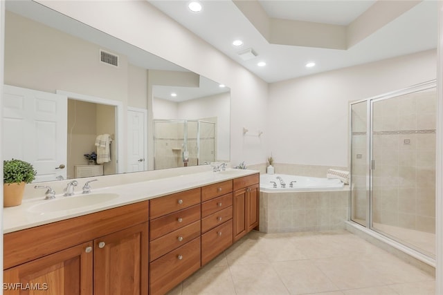 full bathroom with visible vents, a shower stall, tile patterned floors, a bath, and a sink