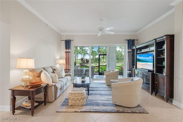 living area with light tile patterned floors, baseboards, crown molding, and ceiling fan