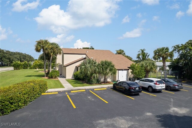 7012 Constitution Blvd Unit 206, Fort Myers, FL 33967 - view of uncovered parking lot