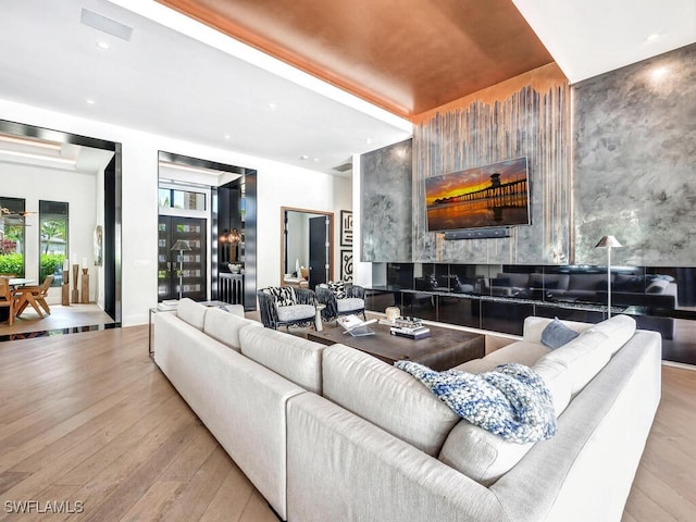 living room with light hardwood / wood-style flooring