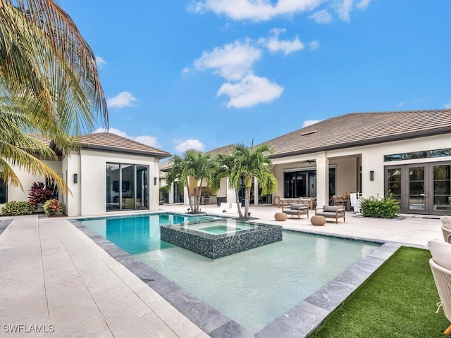 view of swimming pool featuring an in ground hot tub, an outdoor living space, ceiling fan, and a patio