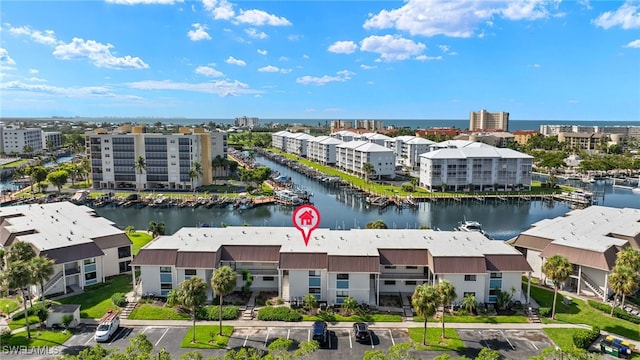 birds eye view of property featuring a water view