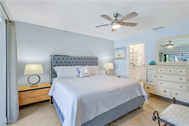 bedroom featuring ensuite bathroom, ceiling fan, and light tile patterned floors