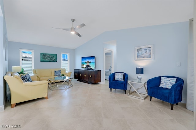 living room with light tile patterned floors, ceiling fan, and lofted ceiling