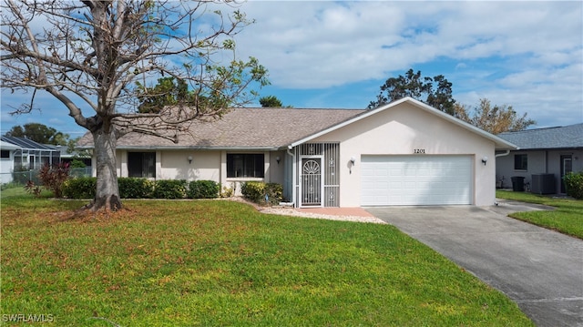 ranch-style house with a front yard, a garage, and cooling unit