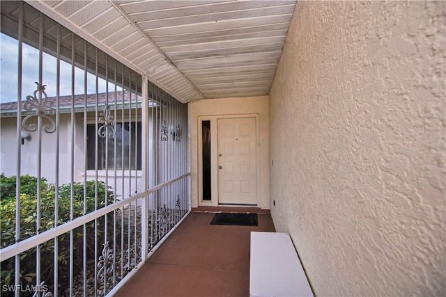 doorway to property featuring a balcony