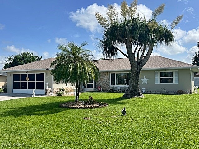 rear view of house with a yard