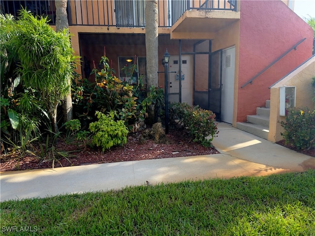 doorway to property with a balcony