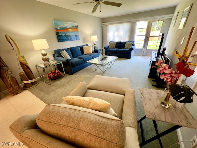 living room with tile patterned floors and ceiling fan