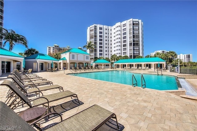 view of swimming pool with a patio area