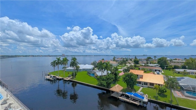 drone / aerial view featuring a water view