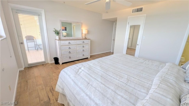 bedroom featuring light wood-style floors, baseboards, visible vents, and a ceiling fan