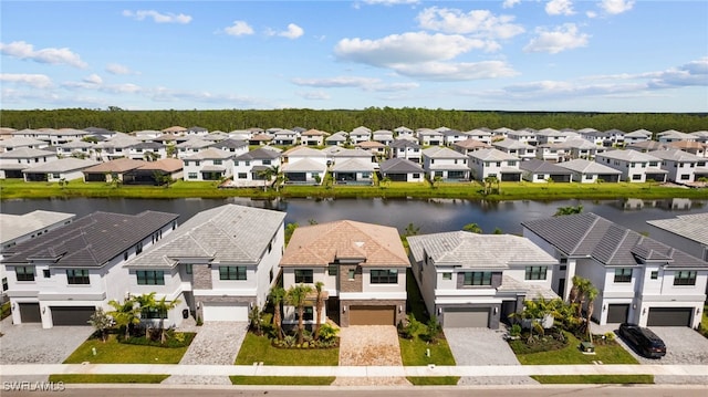 drone / aerial view featuring a water view