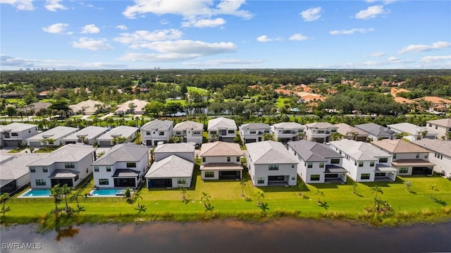 drone / aerial view with a water view