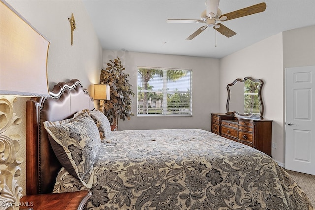 bedroom featuring hardwood / wood-style flooring and ceiling fan