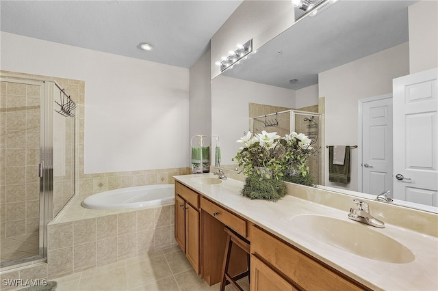 bathroom featuring vanity, tile patterned floors, and independent shower and bath