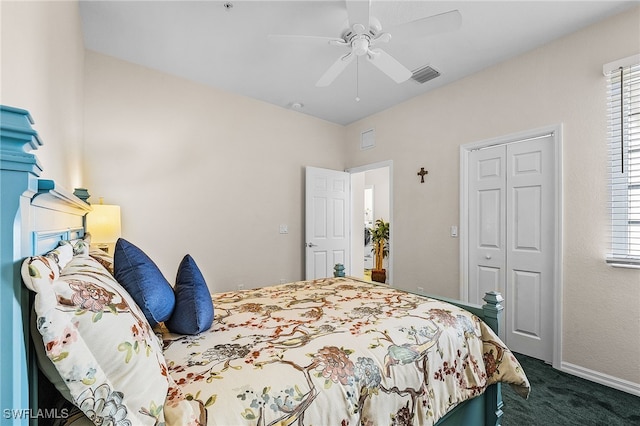 bedroom featuring a closet, ceiling fan, and dark carpet