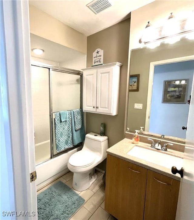 13276 White Marsh Ln Unit 3522, Fort Myers, FL 33912 - full bath with shower / bath combination with glass door, visible vents, toilet, and vanity