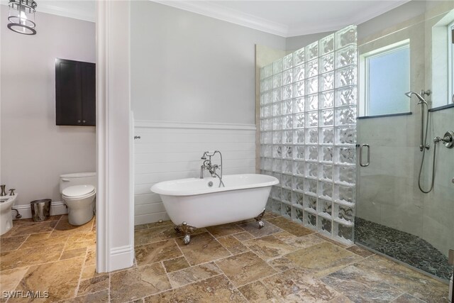 bathroom with toilet, crown molding, independent shower and bath, and a bidet