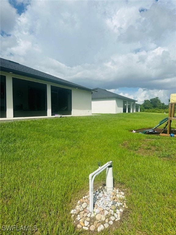 view of yard with a playground