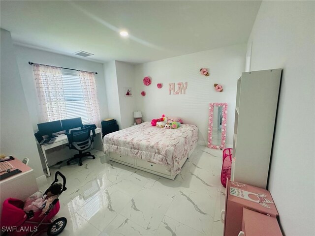 3713 25th St SW, Lehigh Acres, FL 33976 - bedroom featuring visible vents and marble finish floor